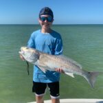 Cole with his biggest redfish